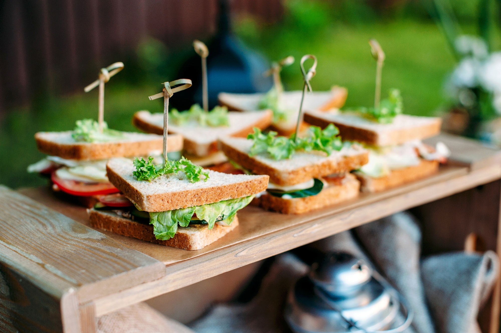 catering banquet buffet table with vegetarian snacks and sandwiches